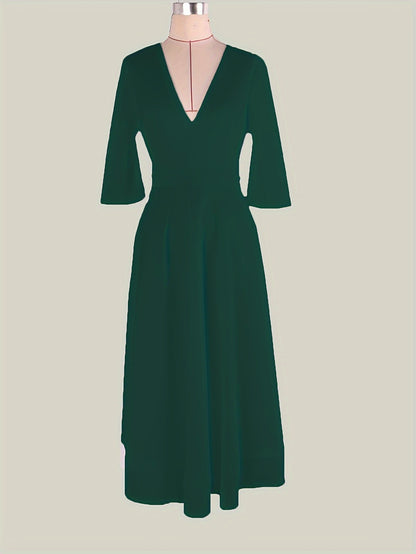 Schwarzes Kleid mit V-Ausschnitt und Taschen - Clara