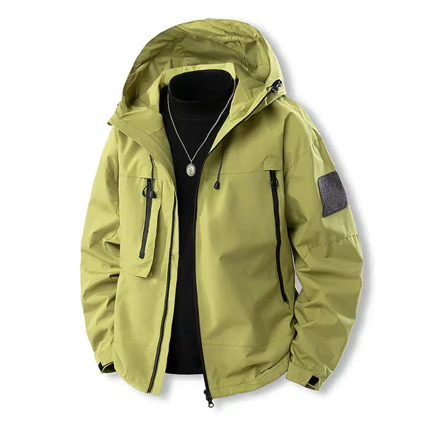 Arvid – wasserdichte outdoor-jacke mit kapuze und pattentaschen