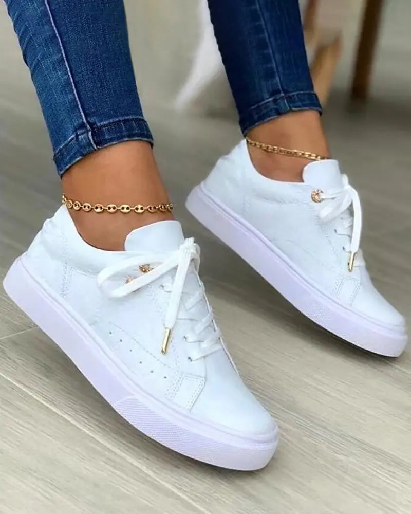 Schicke Sneakers mit Gold-Detail