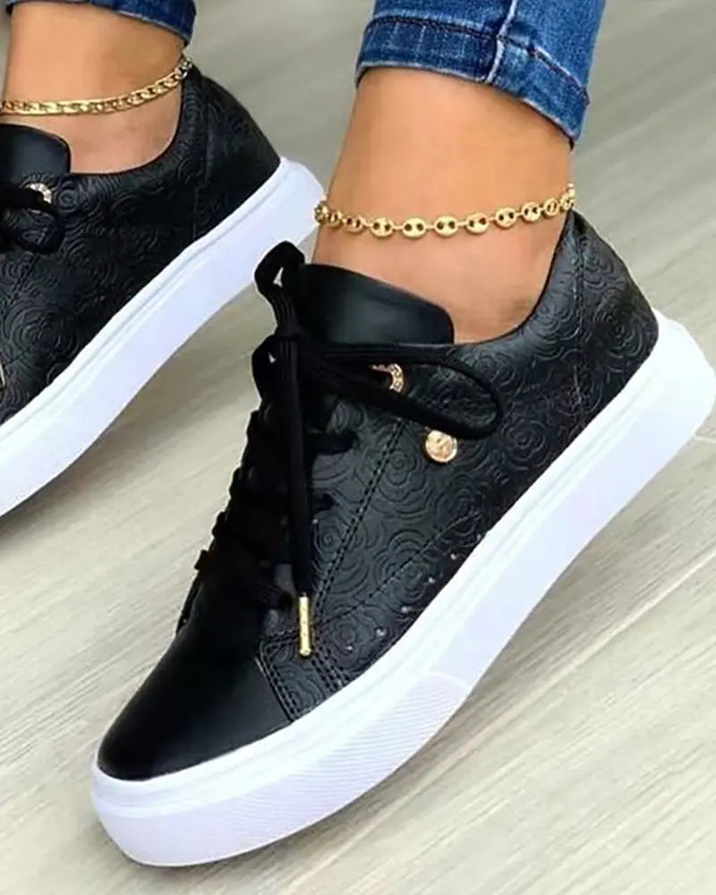 Schicke Sneakers mit Gold-Detail