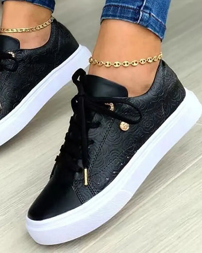 Schicke Sneakers mit Gold-Detail